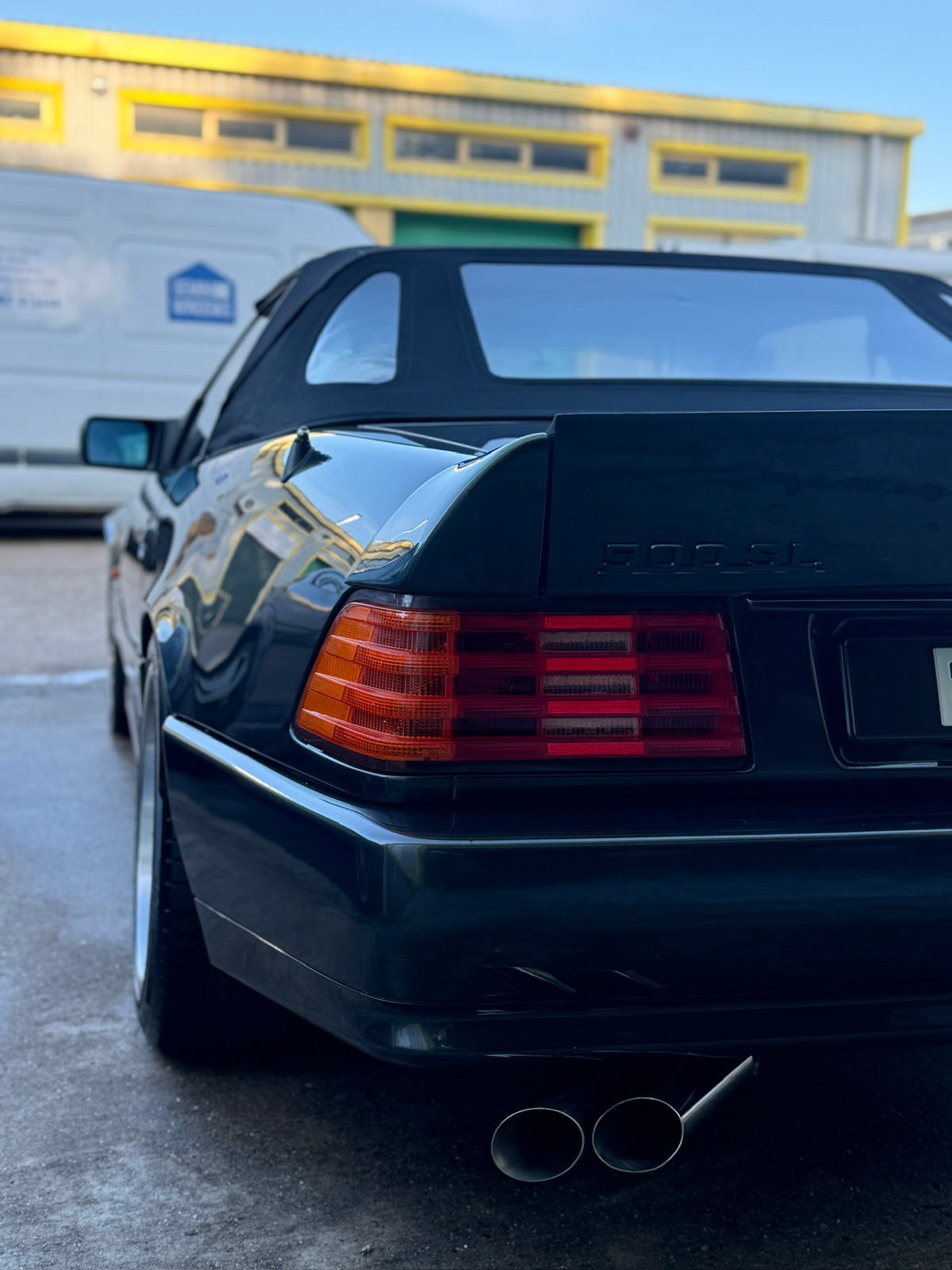 R129 rear high lift AMG duck spoiler fitted to a Mercedes-Benz SL, straight rear view