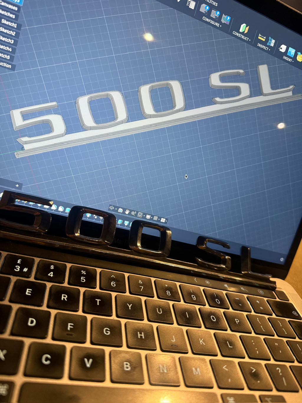 500 SL boot badge reproduction - 3D CAD design shown on screen
